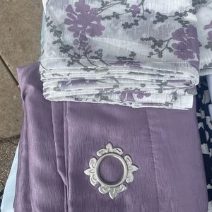 Purple blackout curtains with floral sheer curtains